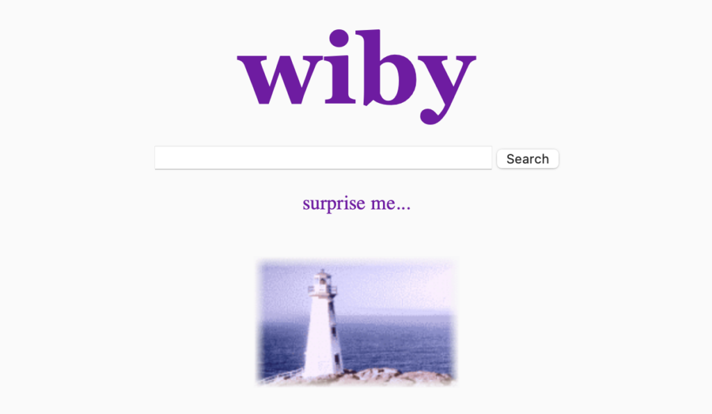 A screenshot of the wiby.me home page, with a search field, a link saying "surprise me..." and a tiny gif of a lighthouse.